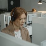 Woman Wearing Black Headphones